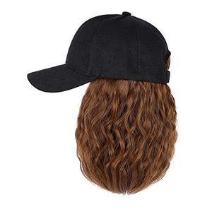Detail of brown wavy synthetic hair extension attached to a black baseball cap