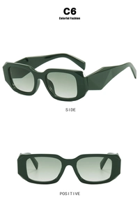 Detail view showing C6 dark green geometric square frames and gradient lenses on sunglasses