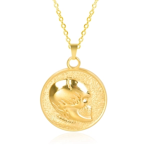 Detailed view of the 18k gold plated stainless steel coin pendant with skull relief