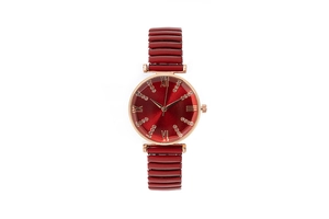 Close-up of red sunray dial with Roman numerals and golden metal chain strap watch