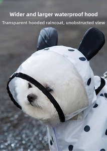 Pet raincoat detail showing wide transparent brim and decorative black bear ears