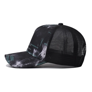 Mesh trucker hat with black and white tie-dye front panel and green lettering