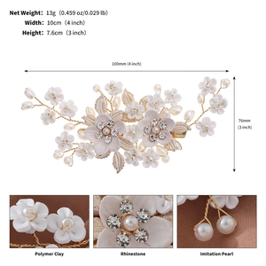 Detail view of handmade flower bridal hair clip with dimensions 10cm by 7.6cm