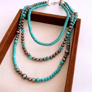Three-layer vintage necklace with turquoise beads and antique silver metal stones