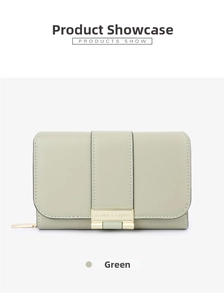 Close-up of light green foldable wallet with gold buckle and cross-grain texture