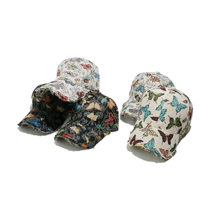 Vintage baseball caps with butterfly embroidery and frayed brim in black and white