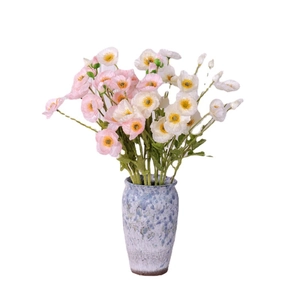Artificial poppy silk flowers in a blue speckled ceramic vase for home decor