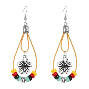 Vintage bohemian flower earrings with colorful beads and silver-toned ethnic charms