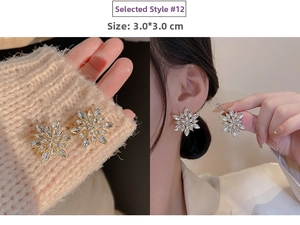 Detailed view of 3.0x3.0cm gold snowflake earrings with crystals and model wear