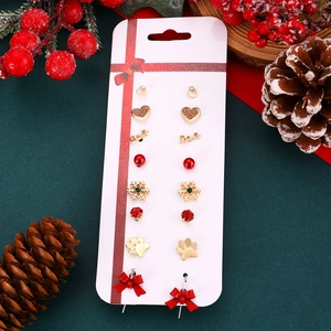Detailed set of 8 Christmas stud earrings featuring snowflakes, hearts and love motifs