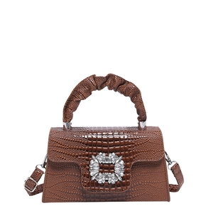 Brown crocodile embossed leather handbag with crystal buckle and ruched handle