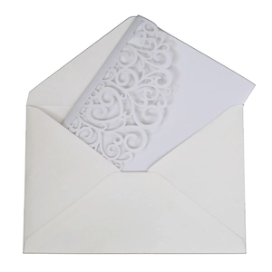 Elegant laser-cut floral wedding invitation with white pearlescent paper and envelope