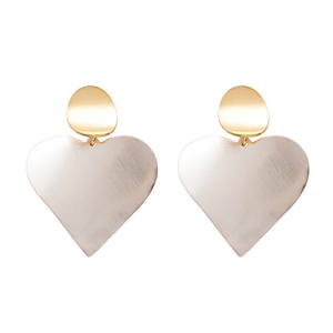 Minimalist geometric heart earrings with gold stud and brushed silver pendant design