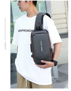 Waterproof anti-theft chest bag featuring a built-in USB port and side combination lock