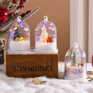 Three LED Christmas tree night lights in bell jars with mini ornaments and warm glow