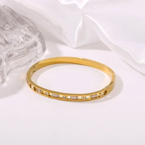 Elegant 18K gold plated stainless steel bangle with square and round zircon stones