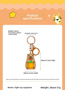 Detailed dimensions of a glowing Capybara plush keychain holding an orange with metal hook