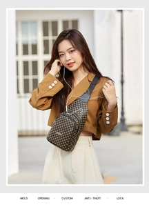 Detail of checkered crossbody chest bag with earphone port and anti-theft zipper pockets