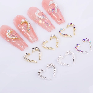 Elegant heart nail charms with pearls and AB rhinestones in gold and silver finish