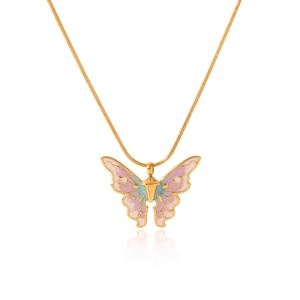 Golden butterfly urn necklace with pink and blue enamel wings on white background