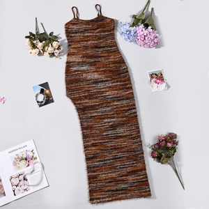 Detailed close-up of striped knit maxi dress with furry texture and side slit detail