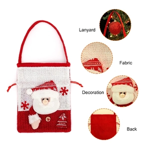 Knitted Christmas Santa gift bag with snowflake patterns and red drawstring lanyard