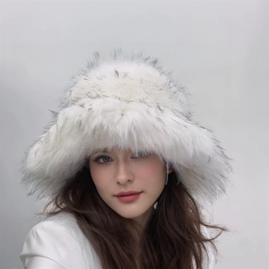 Detail of plush faux fur texture on a thick winter bucket hat with grey tips
