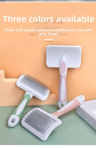 Three colorful pet grooming brushes with stainless steel needles and non-slip handles