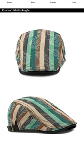 Detail of adjustable metal buckle and paisley striped fabric on a vintage newsboy cap