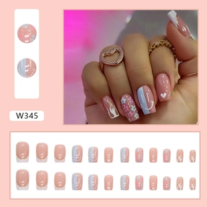 Set of heart and smiley face false nails with pink flower and flame patterns decor
