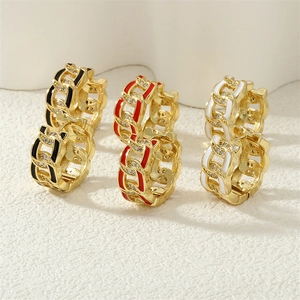 Detailed view of three pairs of 18K gold plated Cuban chain hoop earrings with enamel inlay
