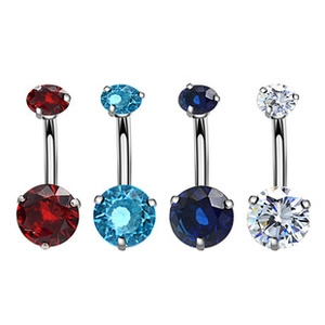 Vue détaillée de piercings de nombril avec zircone colorée et monture à griffes