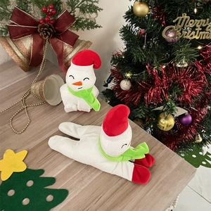 Detail of plush snowman wristbands with red hats and green scarves for Christmas decor