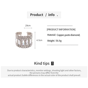 Detail view of silver silver-plated cuff bracelet featuring rhinestones and dimensions
