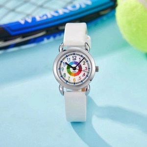 Macro shot of silent quartz watch with colorful dial on a blue sports background