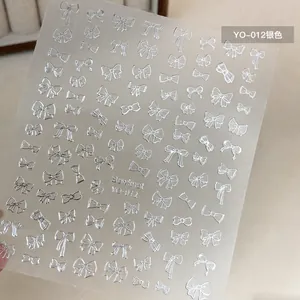 Detail of silver bowknot nail stickers YO-012 with ultra-thin adhesive backing design