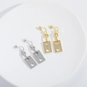 Elegant gold and silver geometric dangle earrings with shimmering pave crystals