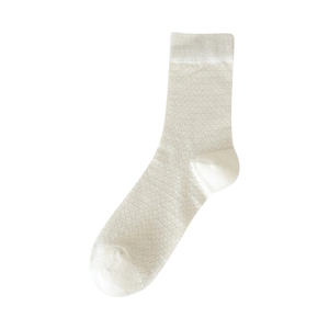White crew socks with diamond hollow-out knit pattern and bow-knot detail
