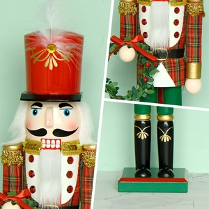 Traditional 38cm wooden nutcracker soldier with red uniform and Christmas wreath