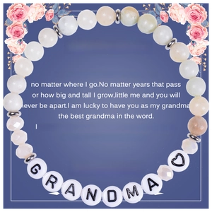 Detailed view of Amazonite beaded bracelet with Grandma letter beads on a floral gift card