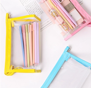 Flat lay of colorful waterproof pencil cases with mesh windows and zipper closure