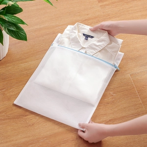 White fine mesh laundry bag with blue zipper for washing delicate shirts and clothes