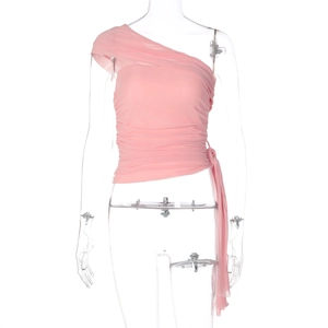 Detail of pink one-shoulder mesh top featuring elegant pleats and side ribbon ties