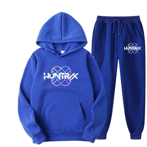 Detail of navy blue hoodie set featuring white HUNTRVX lettering and drawstring pants