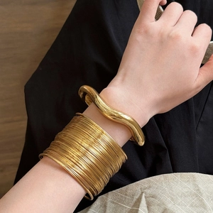 Irregular wide gold arm cuff and multi-layer bangle set for women in minimalist style