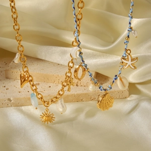 Layered 18k gold stainless steel necklaces with beach charms and blue beads