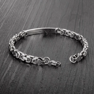Fashion silver stainless steel flat curb link ID bracelet for men on wood background