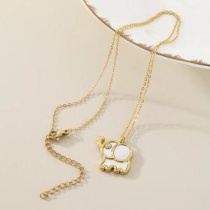 Golden elephant pendant necklace with white inlay and sparkling diamond eye accent