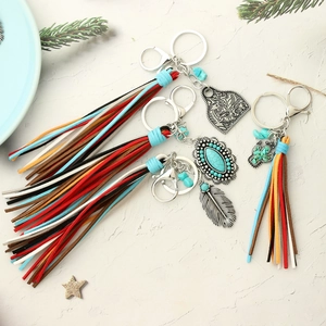 Set of four bohemian leather tassel keychains with turquoise beads and western charms