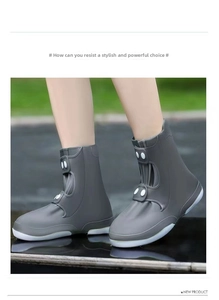 Detail of grey waterproof shoe covers with buckle fasteners and anti-slip sole for rainy days